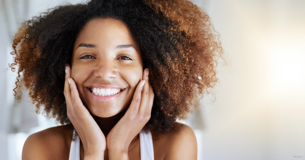 Young woman with a clean, acne-free face.