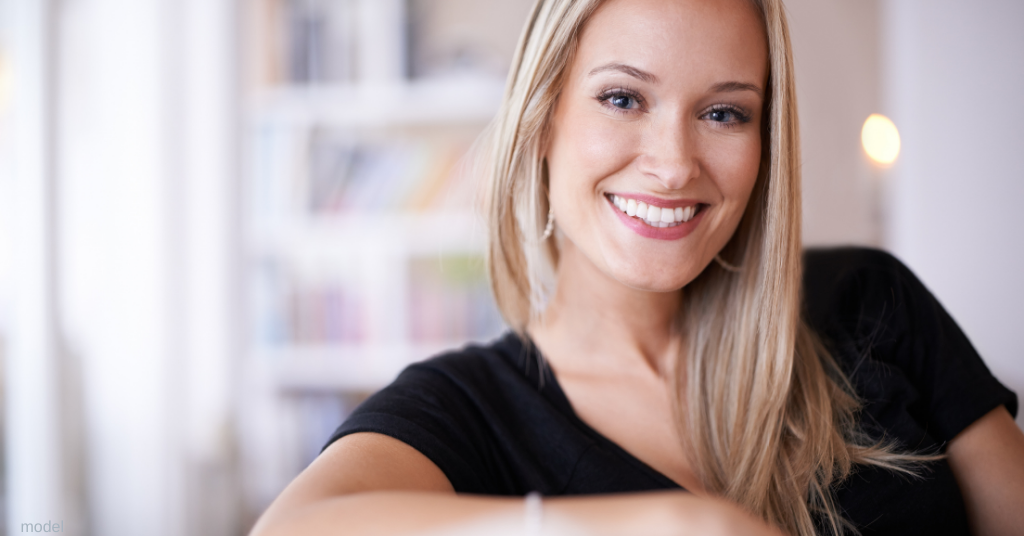 woman on couch learning about dermal fillers