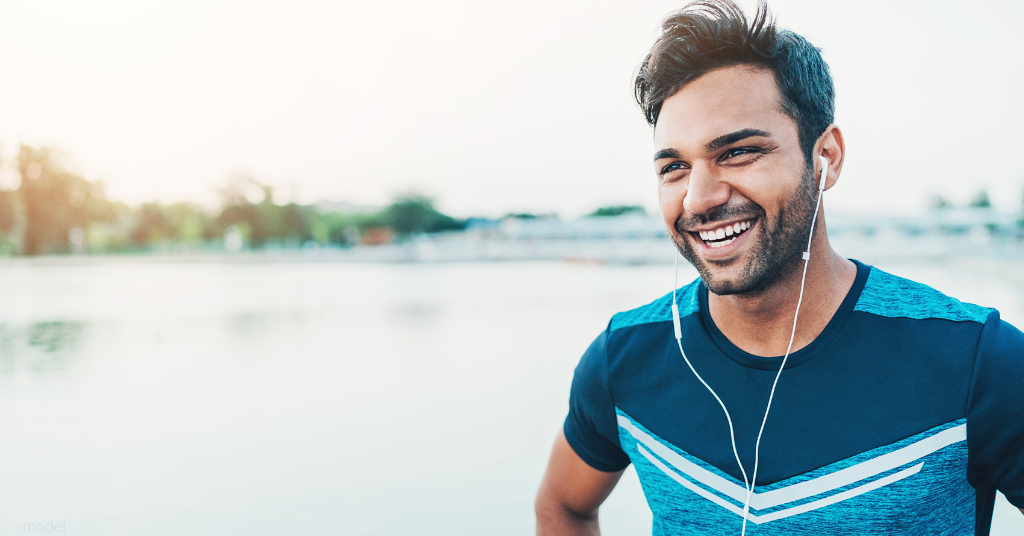 man enjoying sunshine on run (model)